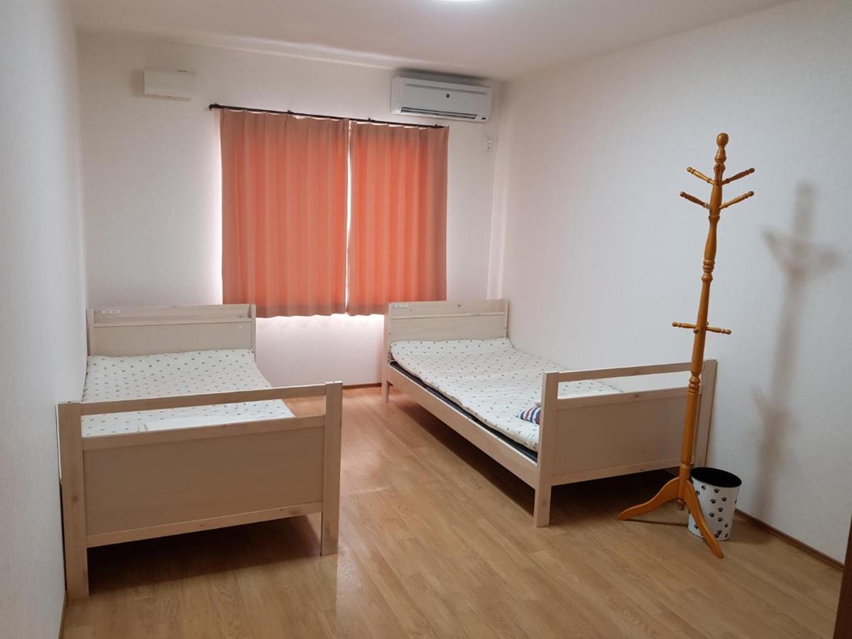 Midori Guesthouse&Hostel สึชิมะ ภายนอก รูปภาพ